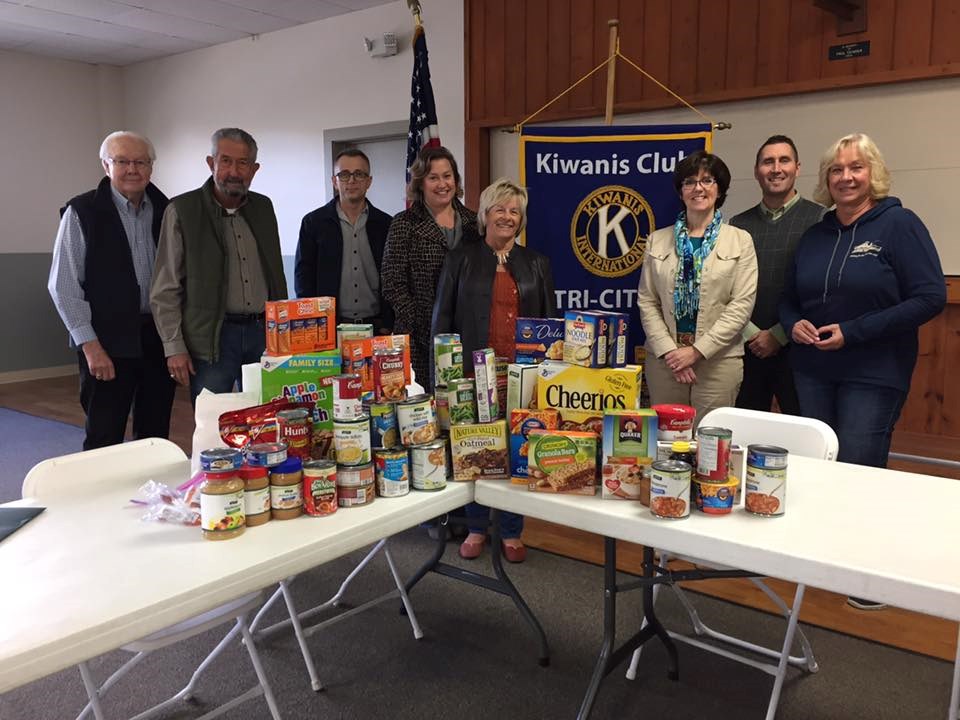 Club members with food pantry donation